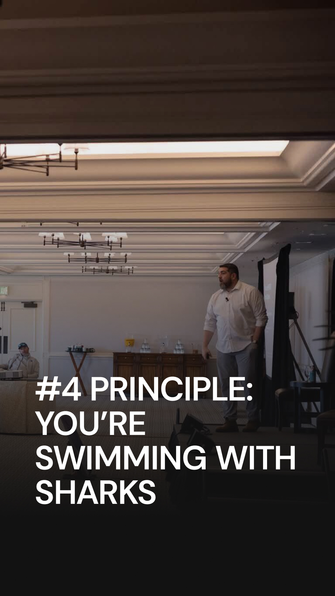 Rob Petrosino presenting principle 4, You're Swimming with Sharks