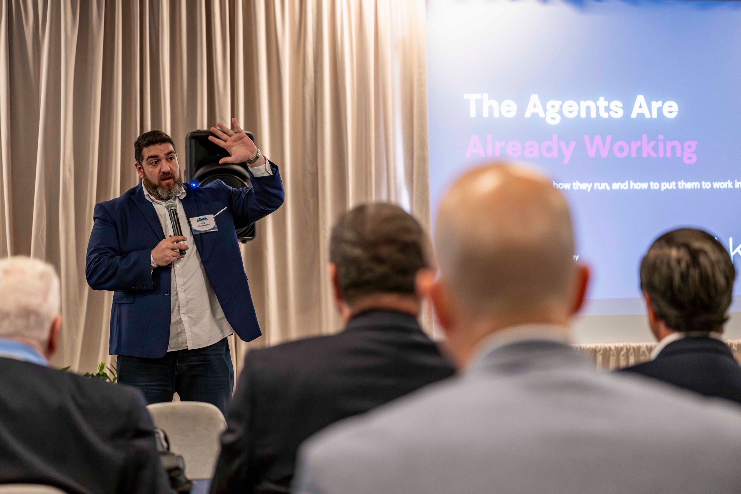 Rob Petrosino speaking to a live audience