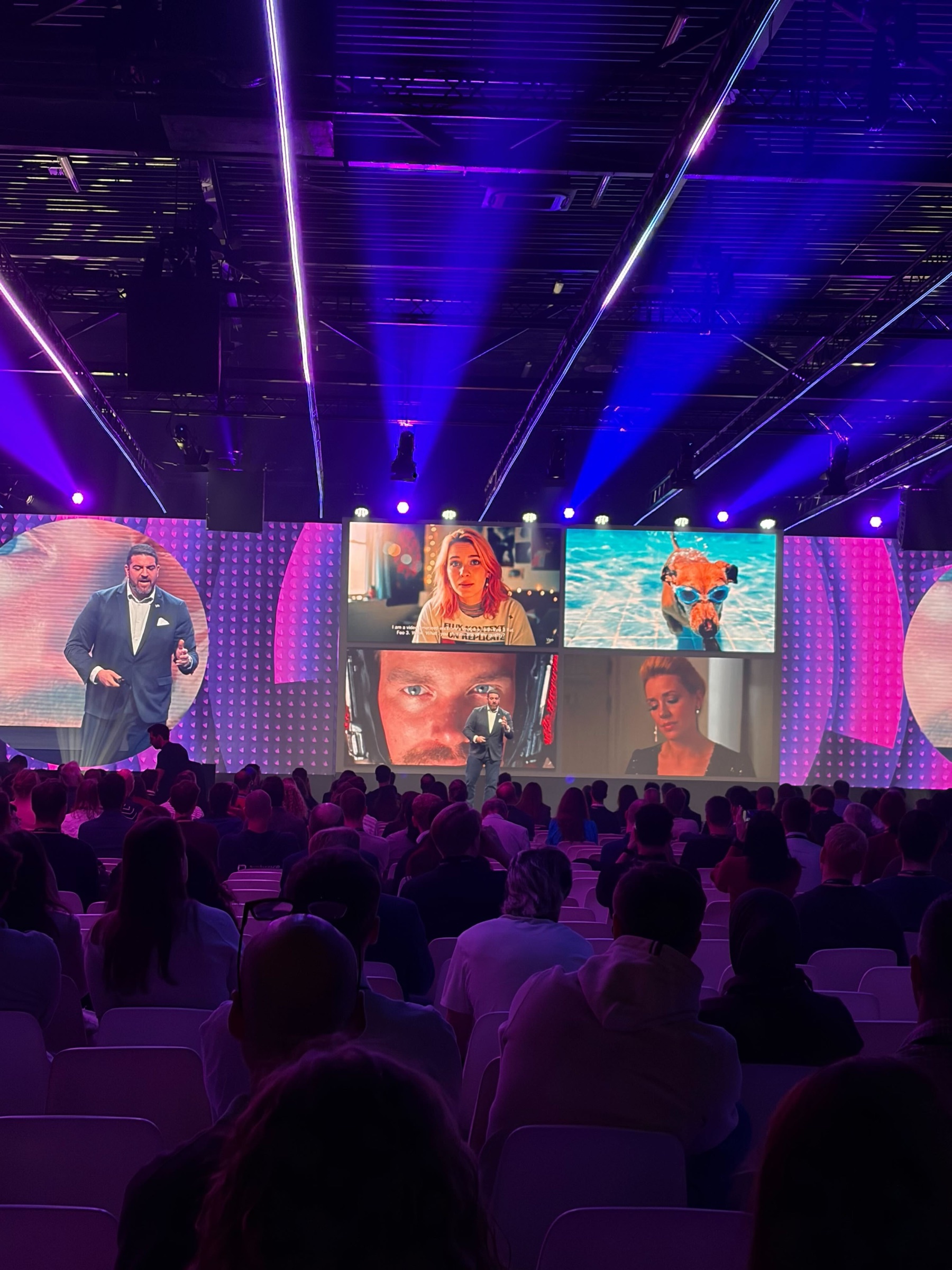 Rob Petrosino speaking on a large conference stage